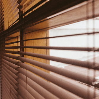 Close up image of blinds in a home made from Ponderosa Pine lumber