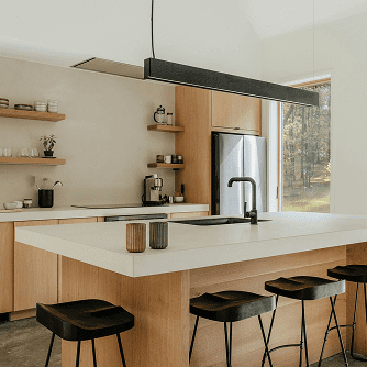A modern kitchen with cabinets made from Ponderosa Pine