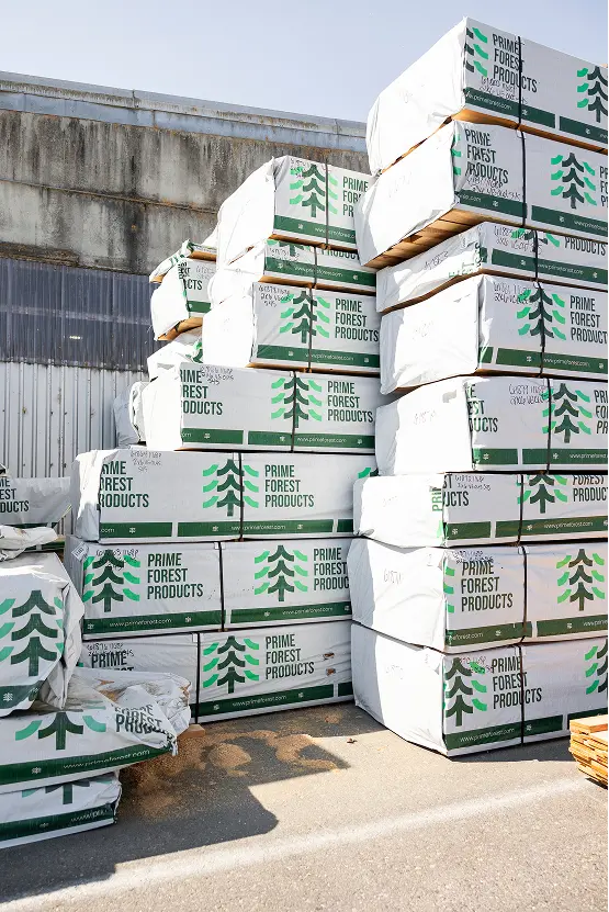 Wrapped Stacks of lumber outside of Prime Forest Products
